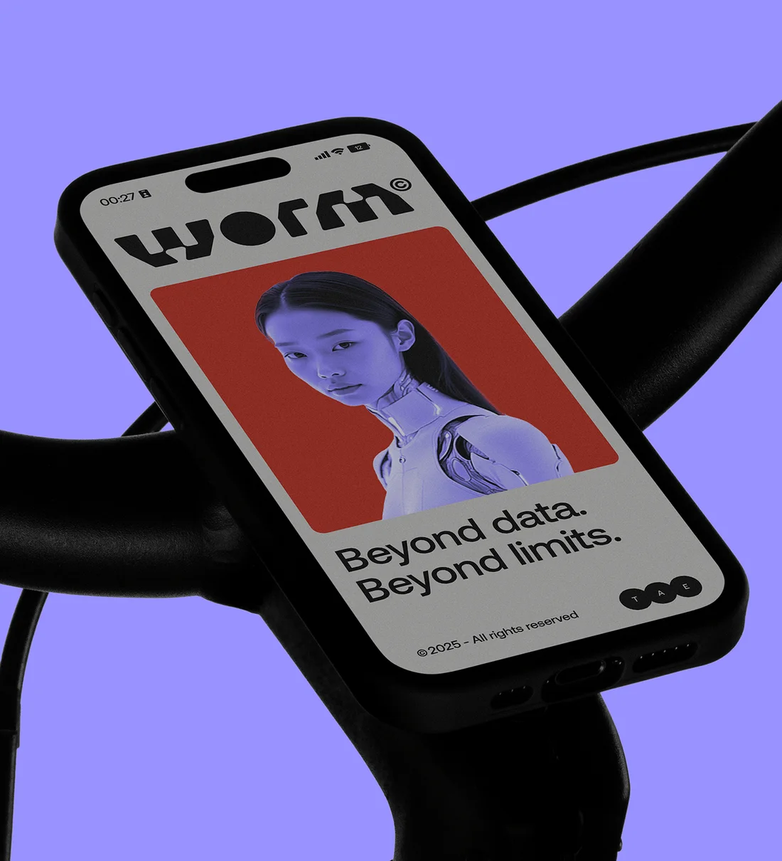 Worm site on a phone mounted on bike handlebars: “Beyond data. Beyond limits.” on lilac